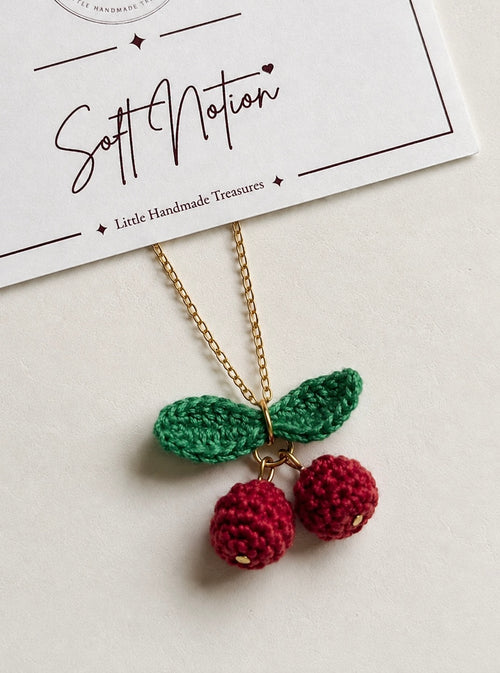 Handmade crochet cherry and leaf necklace with gold-toned chain